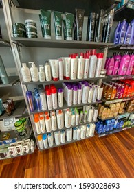 Orlando,FL/USA-12/13/19: Shelves Of Paul Mitchell Hair Shampoo, Conditioner And Styling Products At A Supercuts Hair Salon.