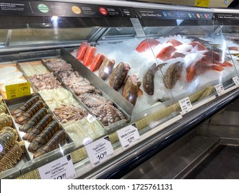 Orlando,FL/USA-5/3/20: A display of lobster, octopus, squid and fish at the seafood department of a Whole Foods Market Grocery Store.