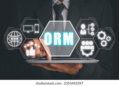 ORM, Online Reputation Management Optimization Business concept, Businessman using tablet with Online Reputation Management icon on virtual screen.