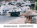Ormos Isternion Beach, place to embrace the Aegean Sea, with its clear waters and cute Cycladic houses, Tinos, Greece