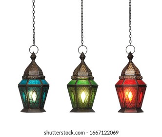 Ornamental Arabic lantern with burning candle glowing isolated o - Shutterstock ID 1667122069