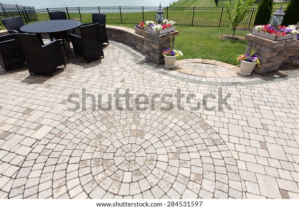 Ornamental Brick Paved Outdoor Patio Circular Stock Image