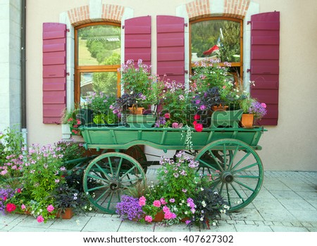 A ornamental cart before building in old town