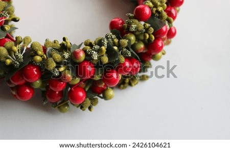Ornamental Chaplet In Branch Shape With Colored Berries And Leaves Closeup Stock Photo
