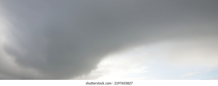 Ornamental clouds. Dramatic sky. Cloudscape. Soft sunlight. Panoramic image, texture, background, graphic resources, design, copy space. Meteorology, weather, climate, heaven, hope, peace concepts