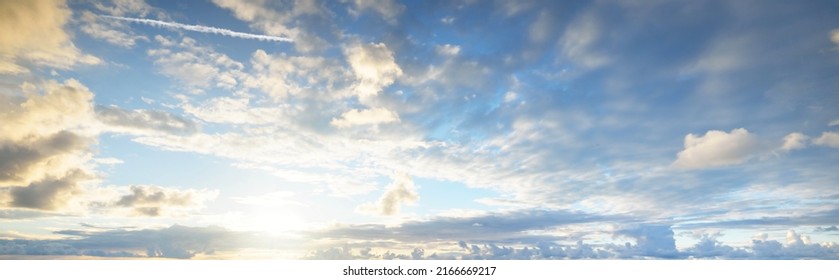 Ornamental clouds. Dramatic sky. Epic storm cloudscape. Soft sunlight. Panoramic image, texture, background, graphic resources, design, copy space. Meteorology, heaven, hope, peace concept - Shutterstock ID 2166669217