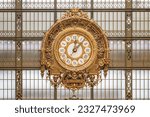 Ornamental golden clock in Orsay Museum, French: Musee d Orsay, in former train station building, Paris, France.