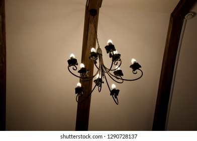 Ornamental Light. Electric Lamp Hanging From Ceiling. Old Ceiling Lamp. Vintage Antique Chandelier. Retro Style Lighting Fixture. Classic Overhead Interior Design. Providing Lighting And Illumination.