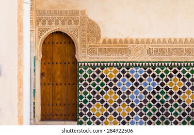 ornate arabic door in alhambra