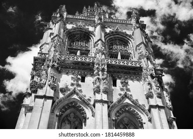 Ornate bell tower of St Mary Magdalene Church in Verneuil-sur-Avre, Eure, Normandy,  France.   Flamboyant Gothic style architecture. Black white historic photo