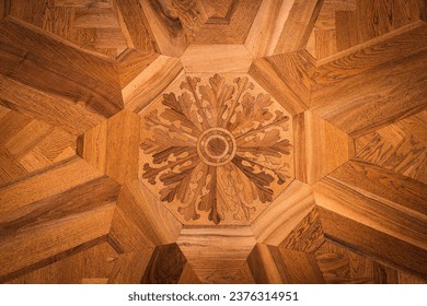 Ornate Cariving of emblem in solid wood floor in copenhagen