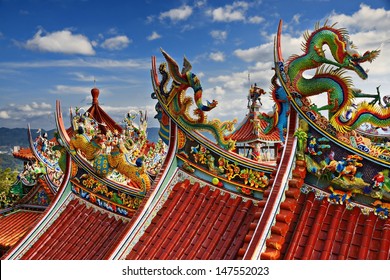 Ornate Chinese Temple detail in the sky.