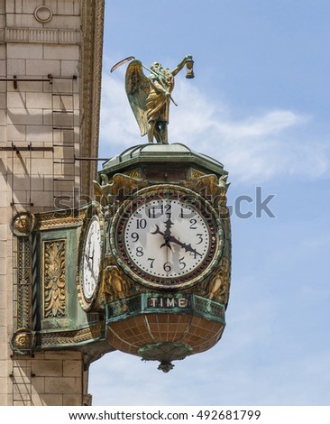 Ornate clock in Chicago, a gift in the early 1920s to the Jeweler's Association. Sculpture is Father Time. Artist unknown.