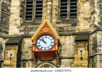 The ornate clock on the exterior of St. Nicholas Cathedral, or Newcastle Cathedral in the historic city of Newcastle upon Tyne, UK.