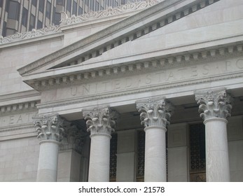 The ornate columns on a United Stated post office in downtown New Haven, CT.