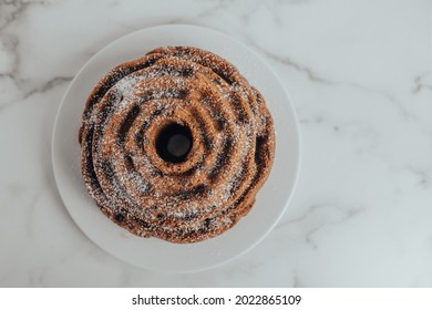 An Ornate And Decorative Homemade And Fresh Chocolate Chip Bundt Cake.