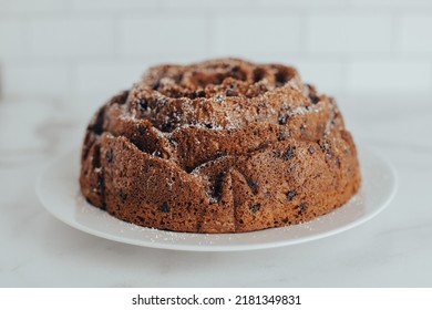 An Ornate And Decorative Homemade And Fresh Chocolate Chip Bundt Cake.