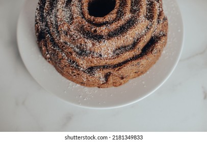 An Ornate And Decorative Homemade And Fresh Chocolate Chip Bundt Cake.