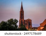 Ornate Gothic facade of the Notre Dame Cathedral in Strasbourg, Alsace, France, beautiful Gothic cathedral at sunset golden hour