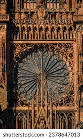 Ornate Gothic facade and the rose window of the Notre Dame Cathedral in Strasbourg, France, one of the most beautiful Gothic cathedrals in Europe