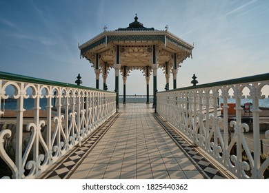Ornate handrails leading to the Victorian bandstand on Brighton and Hove seafront 