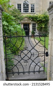 Ornate Iron Gate Of A Beautiful Old English Town House