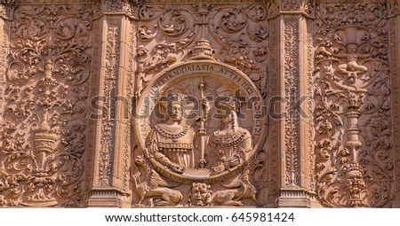 Ornate Medallion of the Catholic Monarchs King Ferdinand and Queen Isabel,  on the facade of the main entrance to Cathedral Nueva Salamanca Spain.