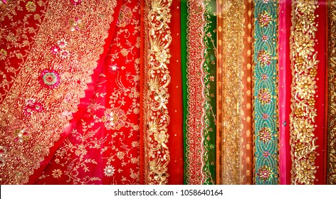 Ornate Red, Green, And Gold Zari Sari Material With Beading. Hyderabad, India