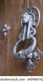 An Ornate Silver Door Knocker, shot in Avila Spain.