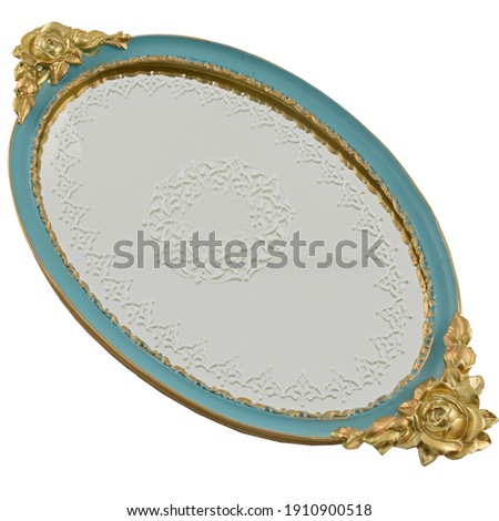 Ornate Tray. Vanity Tray with Gold Ornaments. Polyresin Ellipse Antique Decorative Mirror Organizer for Perfume, Dresser Jewelry and Make up. Isolated Object on White Background. 