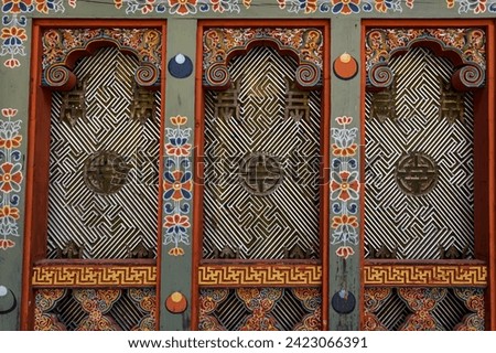 Ornate window and shutters Punakha Dzong monastery in Punakha, Bhutan, Asia