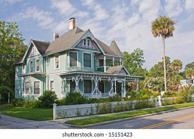 Ornately Detailed Victorian Style Home With Lush Landscape