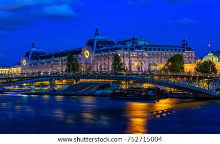 Orsay Museum (Musee d'Orsay) in Paris, France. Night cityscape of Paris. Architecture and landmark of Paris