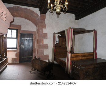 ORSCHWILLER, FRANCE on AUGUST 2018: Wooden bed in chamber of Koenigsbourg castle in european town of Alsace region.
