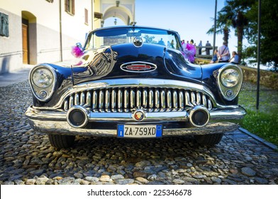 ORTA, ITALY/NOVARA - JULY 18: Front View Of A Buick Skylark, An Old 50s American Convertible Car, Used As A Car For The Ceremonies. Is Parked At The Sacro Monte Di Orta. Orta San Giulio, July 18, 2014