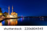 ORTAKOY, ISTANBUL, TURKEY. Ortakoy Mosque and Bosphorus Bridge (15th July Martyrs Bridge) sunrise view.