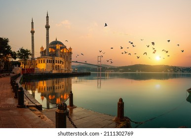 Ortakoy Mosque and Bosphorus bridge in Istanbul at sunrise, Turkey - Shutterstock ID 2111302769