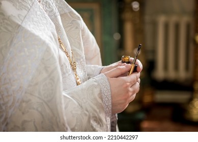 Orthodox Christian Priest Prepares Baptism Ceremony