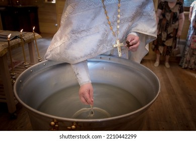 Orthodox Christian Priest Prepares Baptism Ceremony