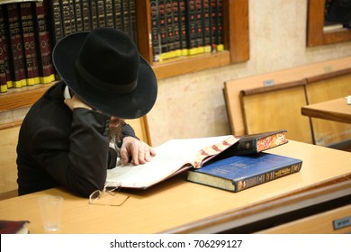 Orthodox Jew Studying Torah
. Special character of the Jewish rabbi, with a white beard and black hat