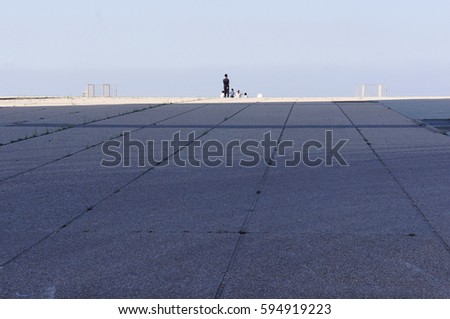 Similar – Senior sportswoman with headphones running