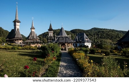 The Orthodox Monastery from Bârsana is a monastic complex that hosts in the natural space, dominated by red flowers, from Maramureș, traditional wooden and stone constructions of the Orthodox cult