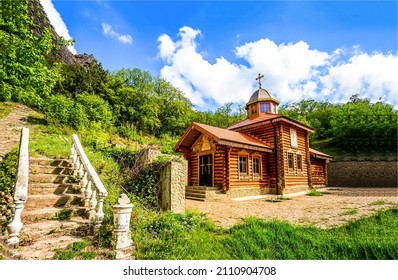 Orthodox wooden church in the mountains. Wooden church in mountains. Orthodox church. Wooden russian church