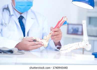 An Orthopedic Doctor In His Office, A Doctor Sitting At An Office At A Orthopedic Clinic