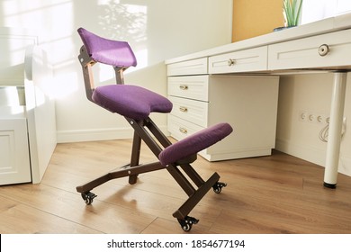 Orthopedic Ergonomic Kneeling Chair In The Interior Of Children's Room, Home Office. Taking Care Of Your Back Health, Healthy Lifestyle