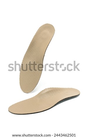 Orthopedic insole isolated on white background. Treatment and prevention of foot diseases.