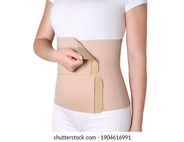 Orthopedic lumbar corset on the human body. Back brace, waist support belt for back. Posture Corrector For Back Clavicle Spine. Post-operative Hernia Pregnant and Postnatal Lumbar brace after surgery.