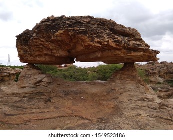 Orvakal Rock Garden, Kurnool,Andhra Pradesh, India Is The Ancient Cave And Igneous Rock Formation Between Pools Of Water.