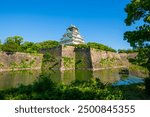 Osaka Castle main keep (Tenshu) on inner wall. Osaka Castle is a Japanese castle in Chuo ward in historic city of Osaka, Japan. It