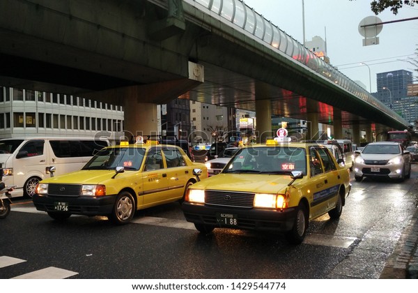 OSAKA, JAPAN - 13 APR 2016 : Traffic and\
urban life in Osaka, Japan. Osaka is the second largest\
metropolitan area in Japan and among the largest in the world with\
over 19 million\
inhabitants.